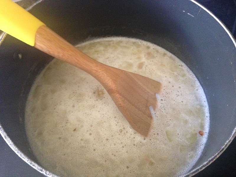 sautéed onion and garlic with couscous and broth